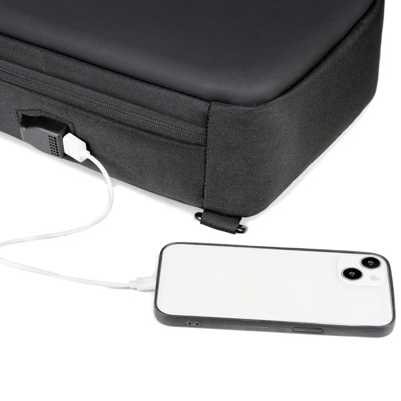 UrbanSling Pro – Sacoche bandoulière homme coque rigide, antivol, port USB & imperméable