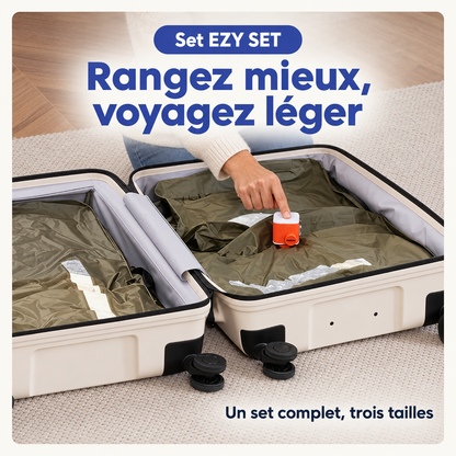 Valise cabine ouverte avec des sacs de compression vert kaki et une petite pompe orange, set EZY SET